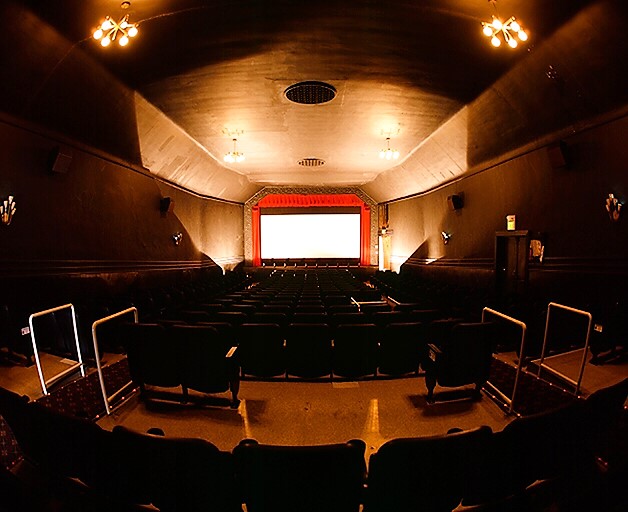 Vintage auditorium with tiered seating, ideal for intimate screenings and presentations.