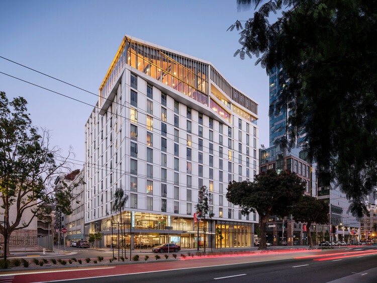 Modern hotel with large windows, perfect for corporate meetings and events.