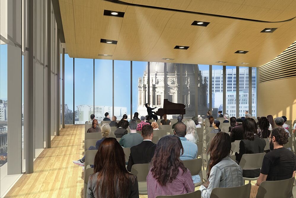 Modern event space with large windows, piano, ideal for performances and conferences.