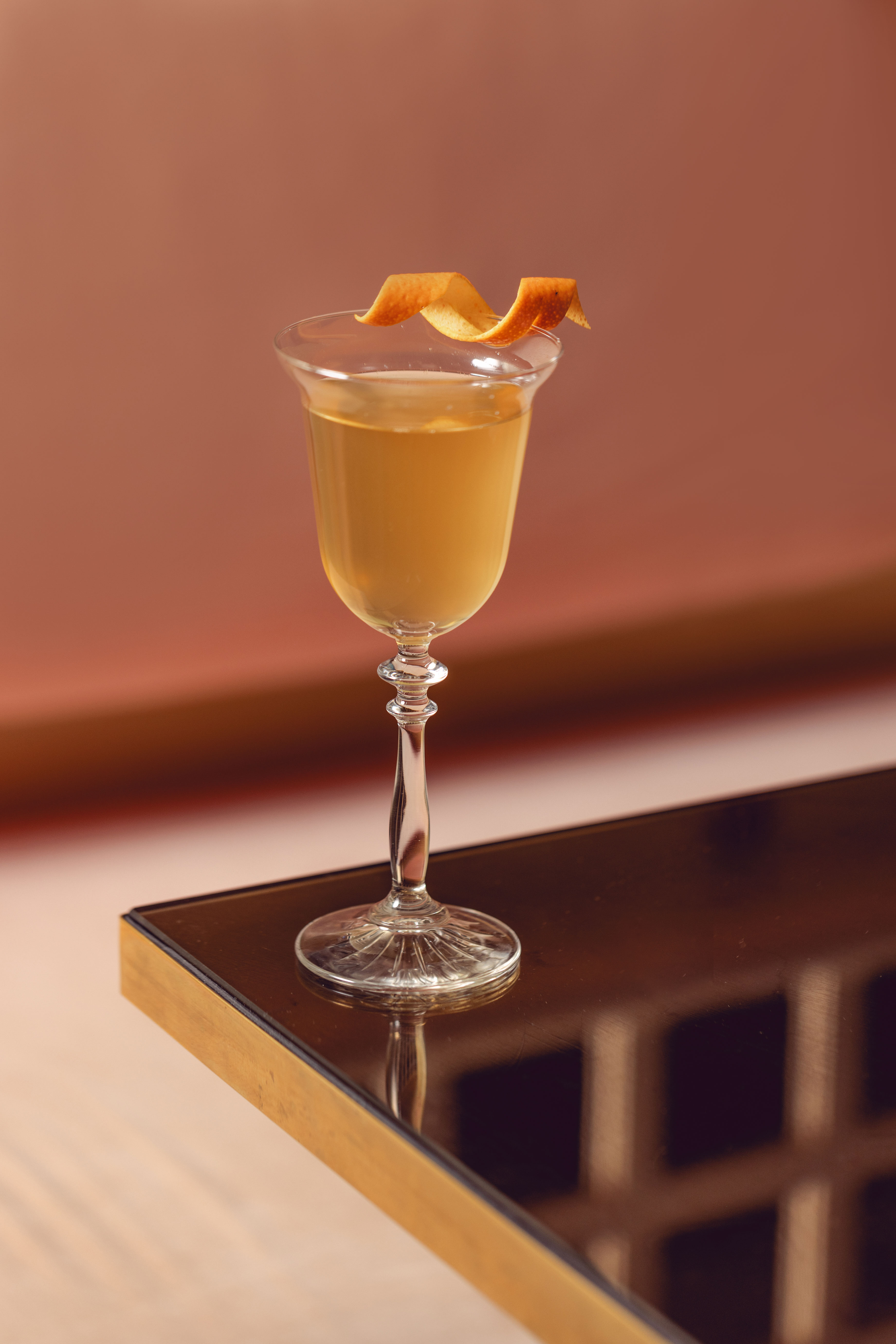 Elegant cocktail in glass at JOIA Restaurant, perfect for upscale events and receptions.