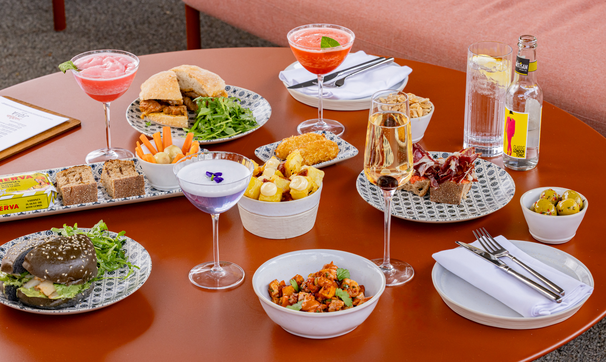 "Vibrant cocktail spread at JOIA Rooftop, perfect for networking events in London."