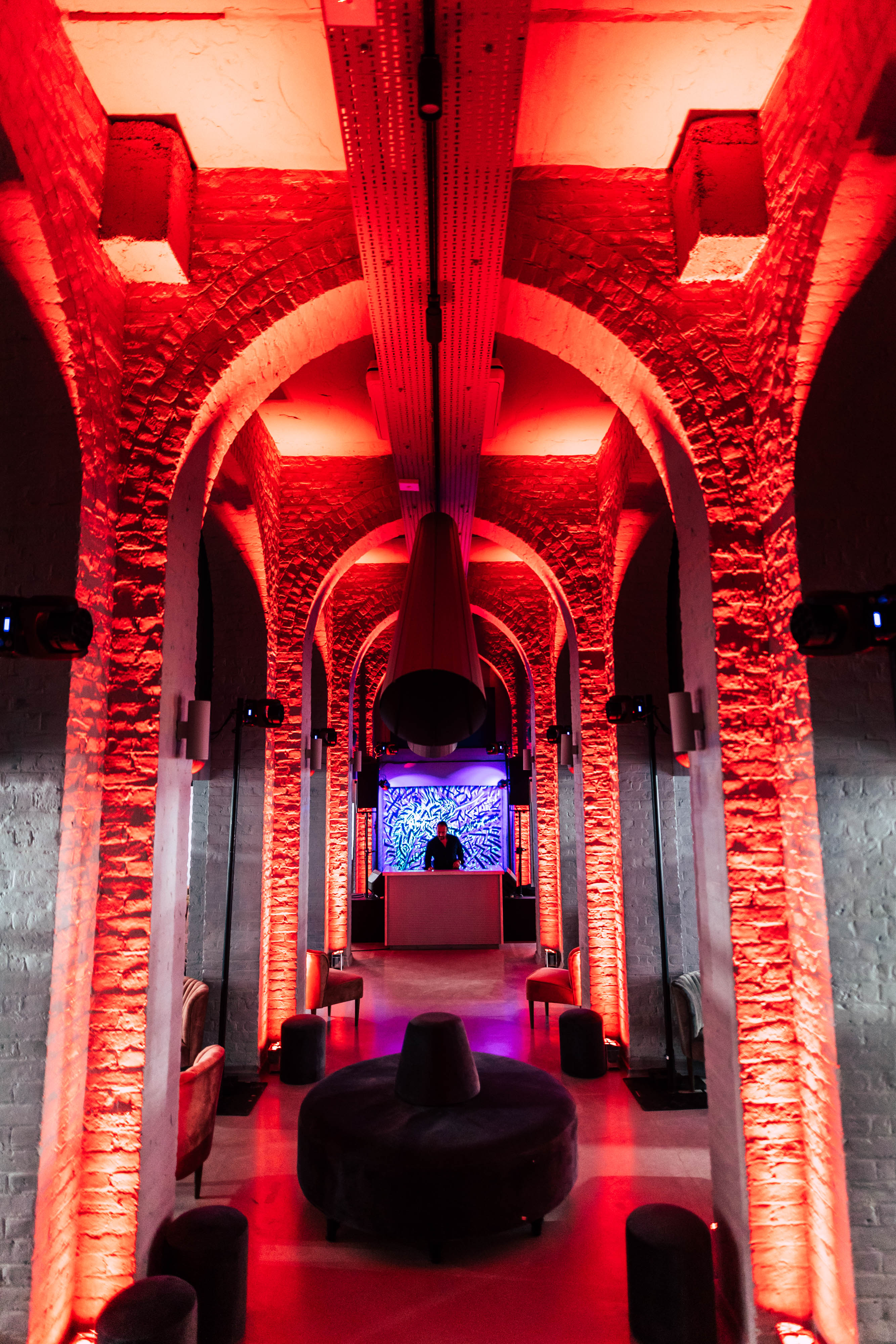 The Vaults at One Marylebone with dramatic red lighting for events and gatherings.