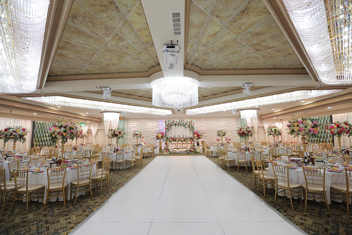 Grand Ballroom at Mirage Venue with elegant chandeliers, perfect for weddings and events.