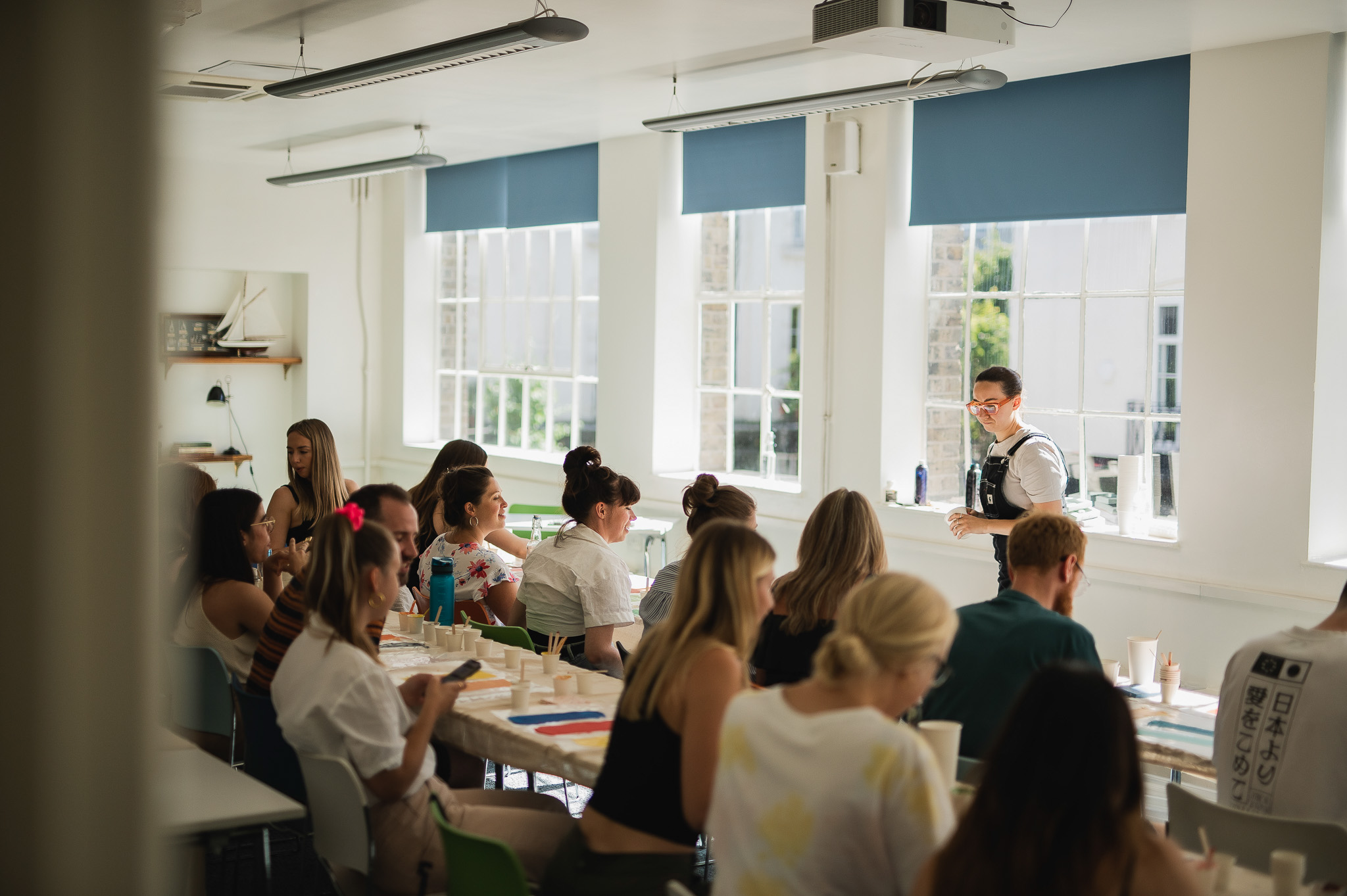 Workshop attendees engaged in a collaborative seminar at Wallacespace St Pancras.