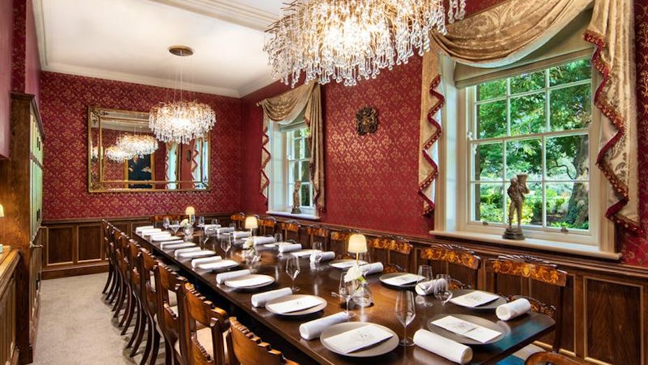 Elegant private dining room in The Manor Leeds, perfect for formal events and meetings.