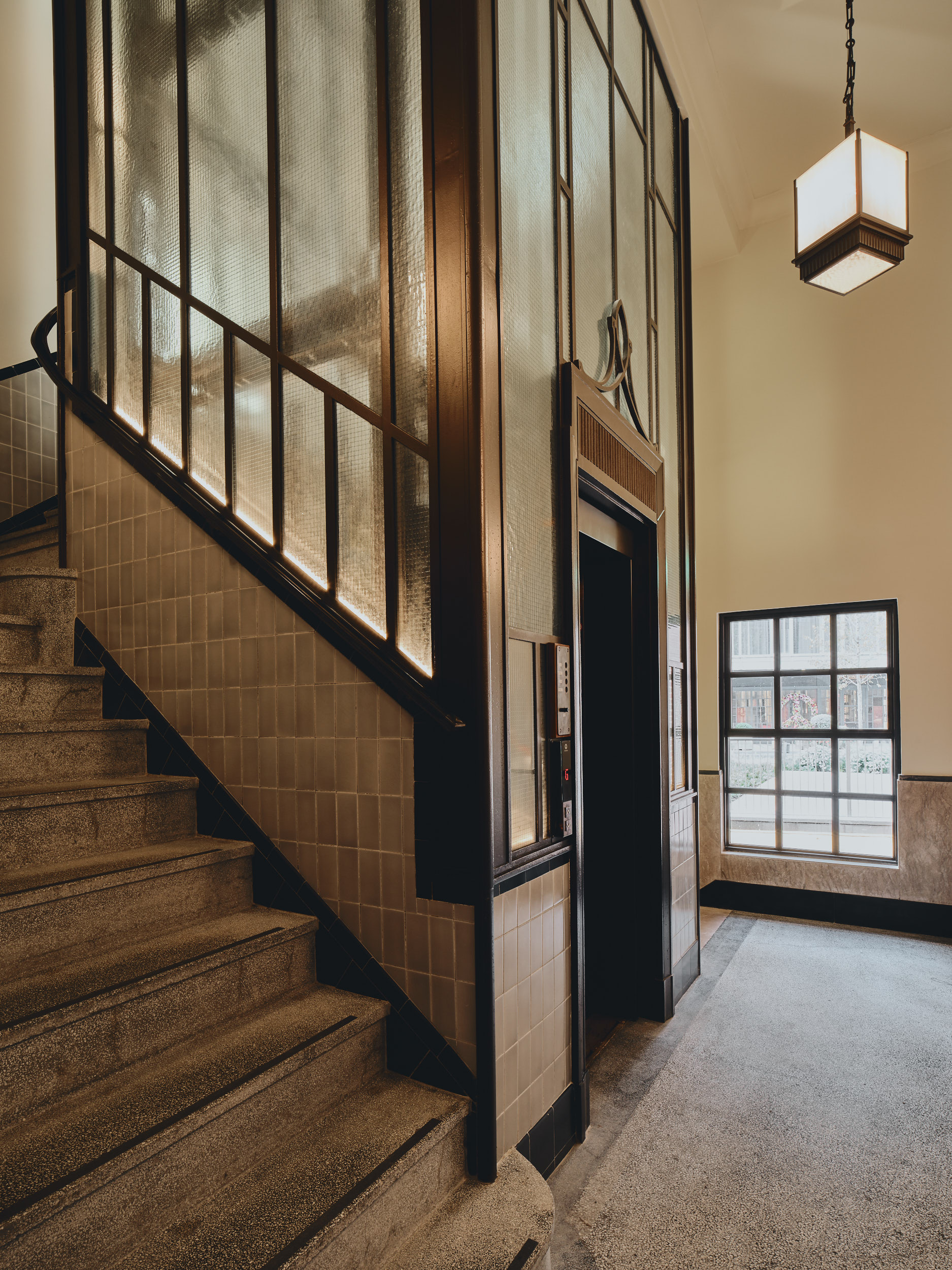 Control Room A at Battersea Power Station, featuring a staircase and elevator for events.