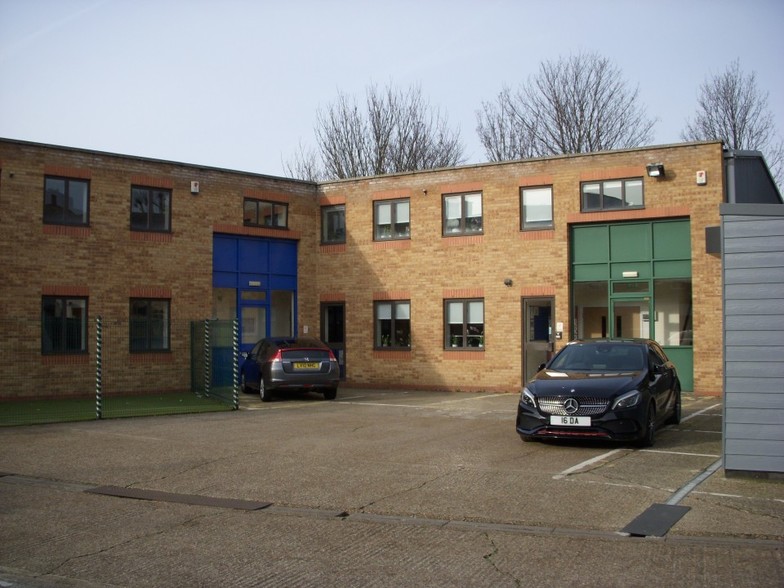 Modern multi-story event venue in East London with large windows and ample parking.