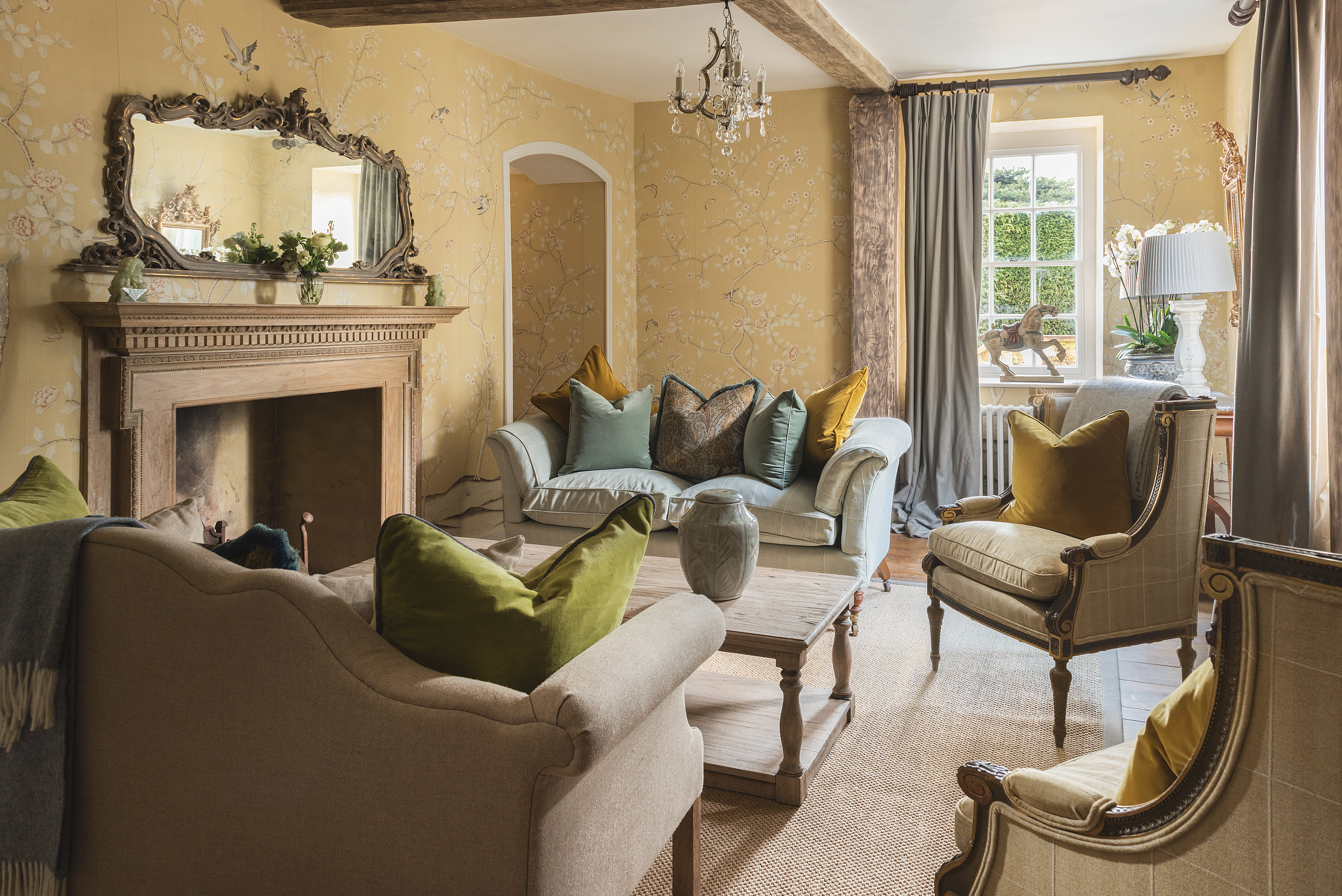 "Battel Hall meeting space at Leeds Castle, featuring plush seating for intimate gatherings."