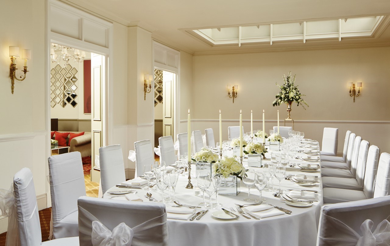 Elegant banquet setup in Covent Garden Room, ideal for upscale events and gatherings.