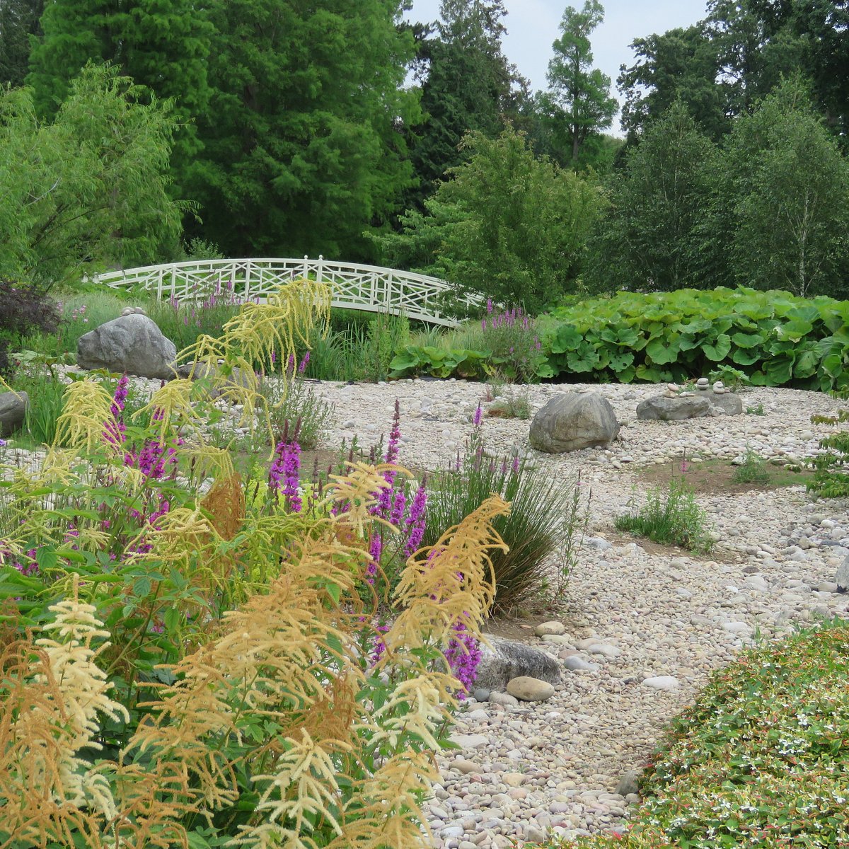 Deer Park outdoor event venue with white bridge, ideal for weddings and retreats.