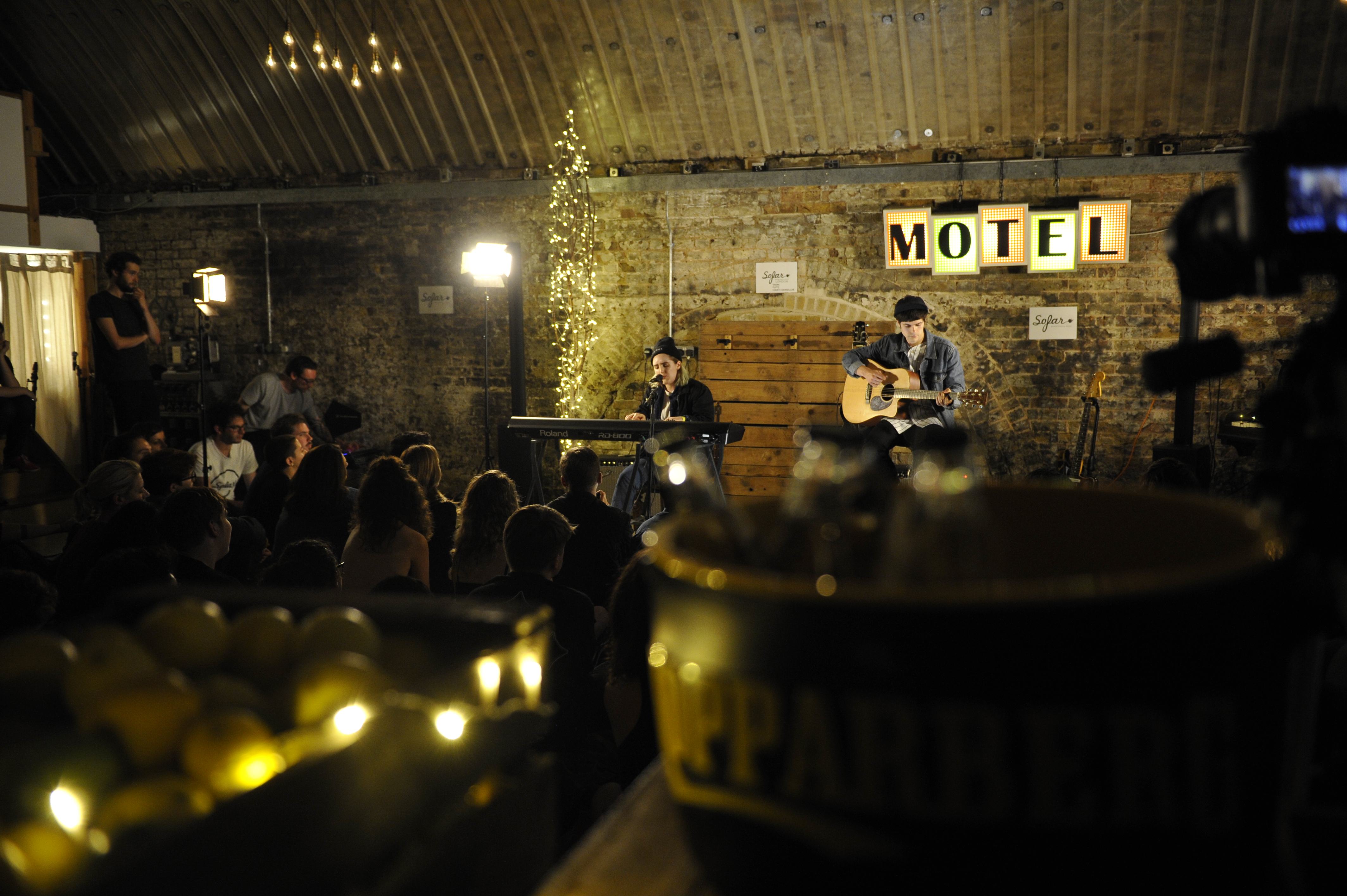 Intimate live performance venue with warm lighting, ideal for events and acoustic nights.