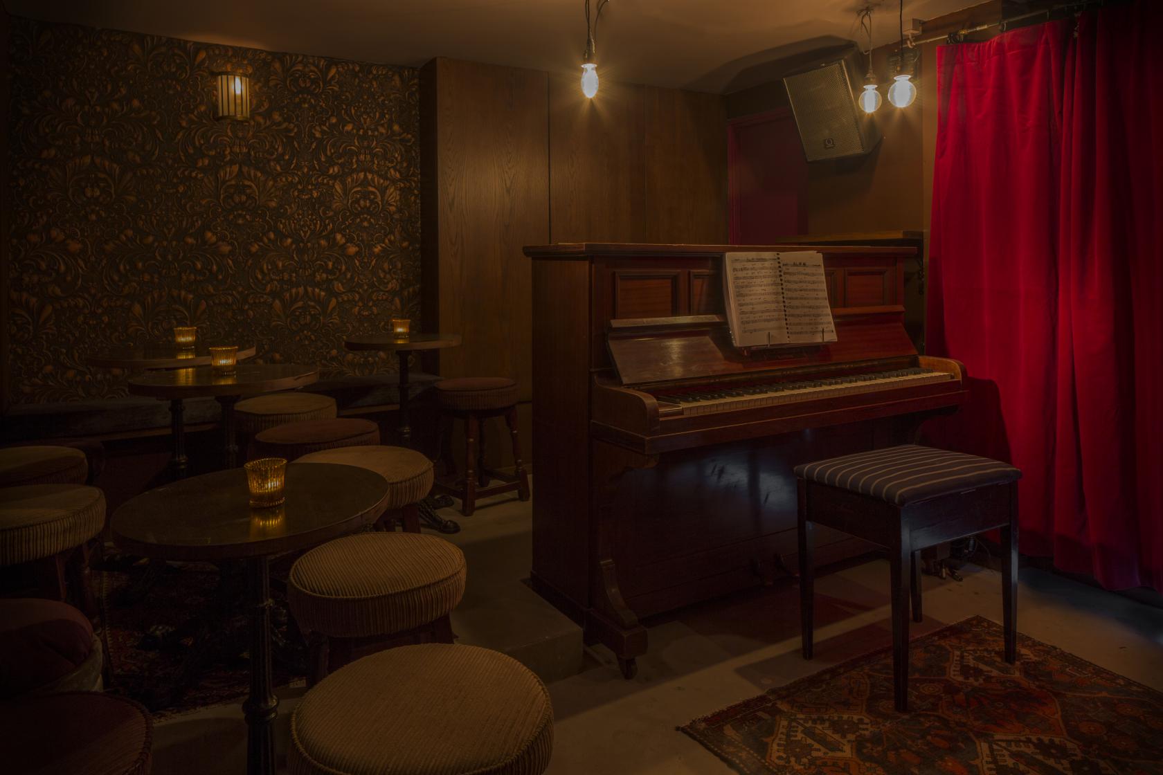 Intimate Green Note venue with warm lighting, ideal for live music and private events.
