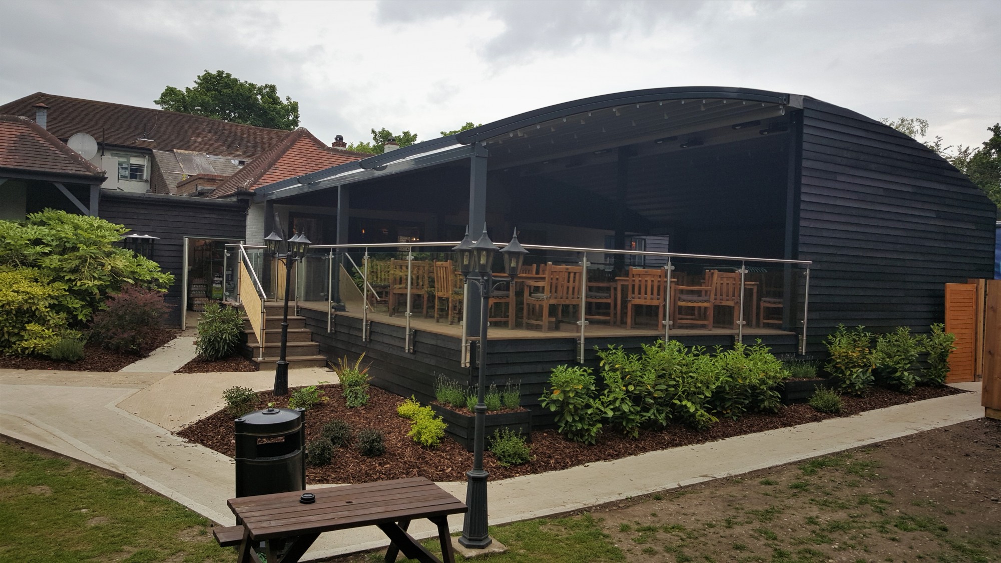 Outdoor event space at The Gate Arkley, featuring greenery for corporate gatherings.