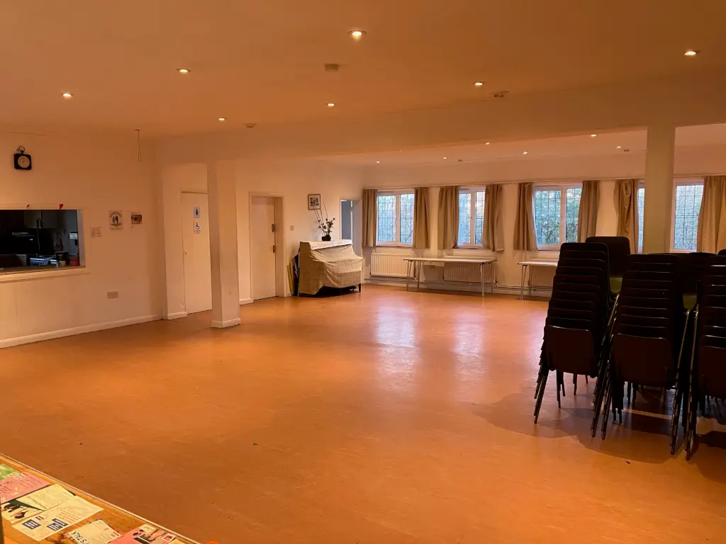 Versatile event space with natural light at Hope Corner Community Centre for meetings and workshops.