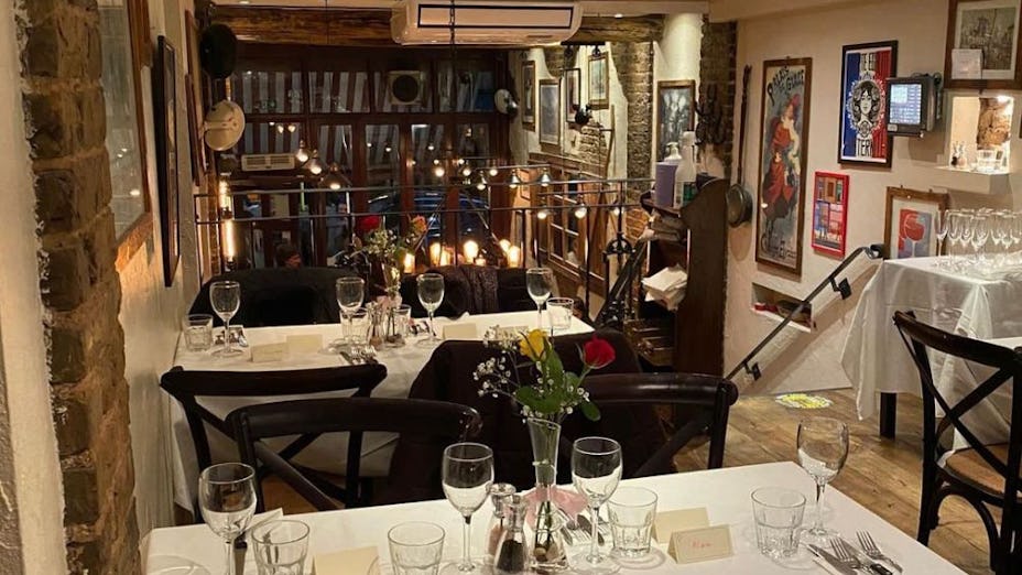Cozy dining space at La Petite Auberge, perfect for private events and gatherings.