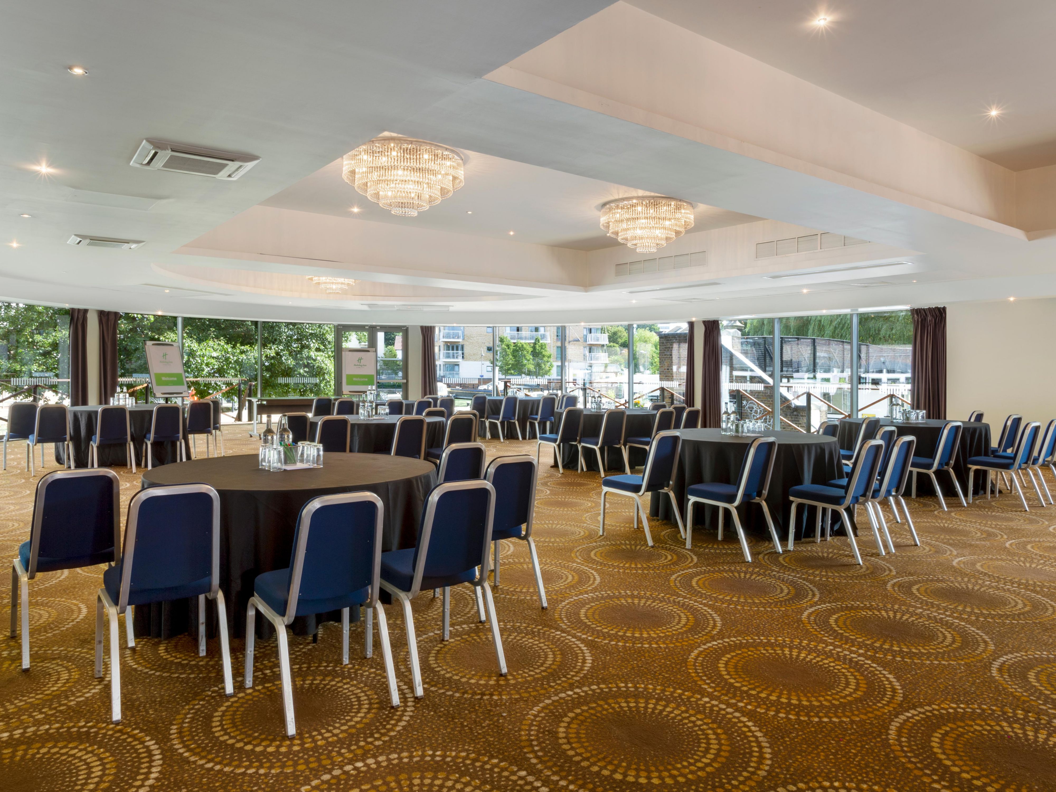 Brentford Boardroom with round tables, ideal for meetings and conferences.