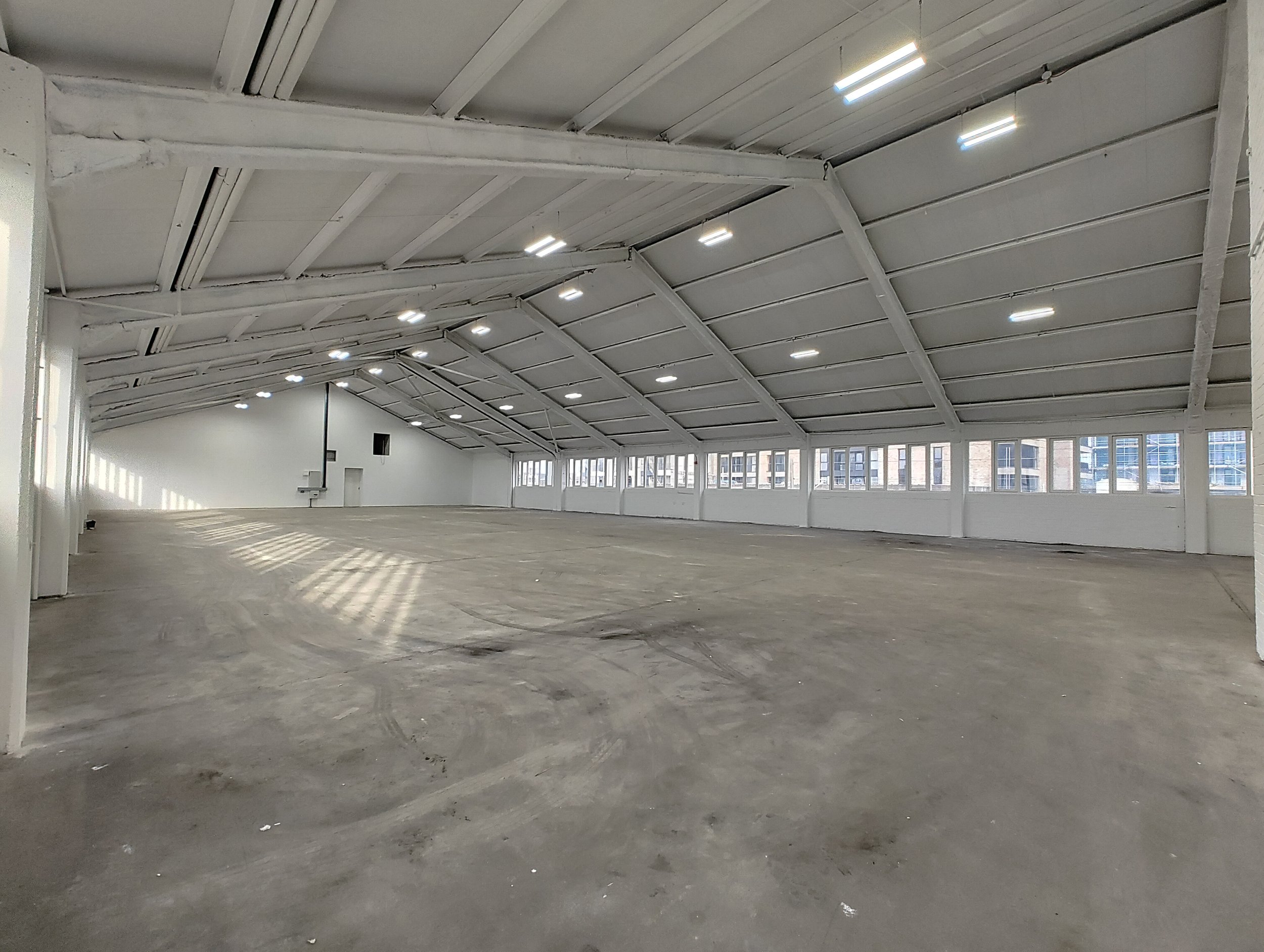 Spacious White City Warehouse venue with high ceilings for conferences and exhibitions.
