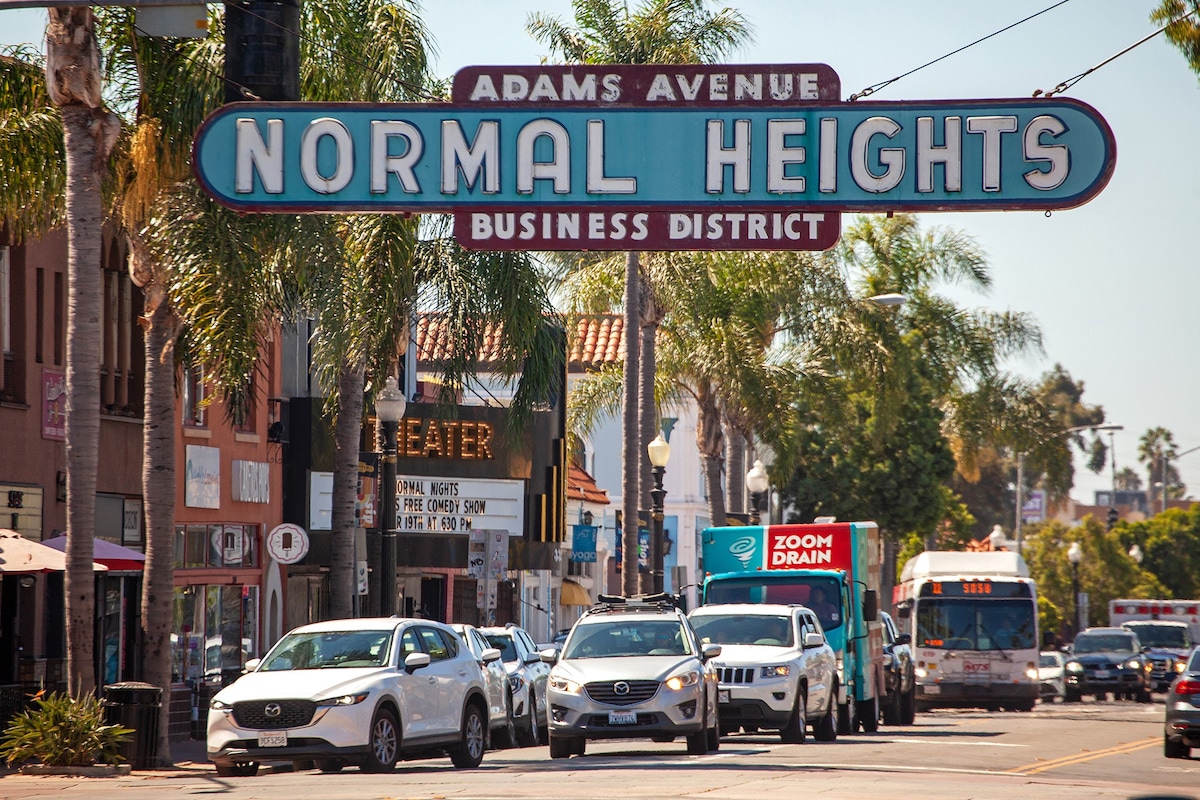 Vibrant Adams Avenue Theater scene with palm trees, ideal for outdoor events and gatherings.