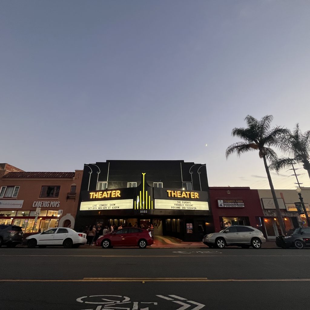 Vintage Adams Avenue Theater with marquee, perfect for events and screenings.