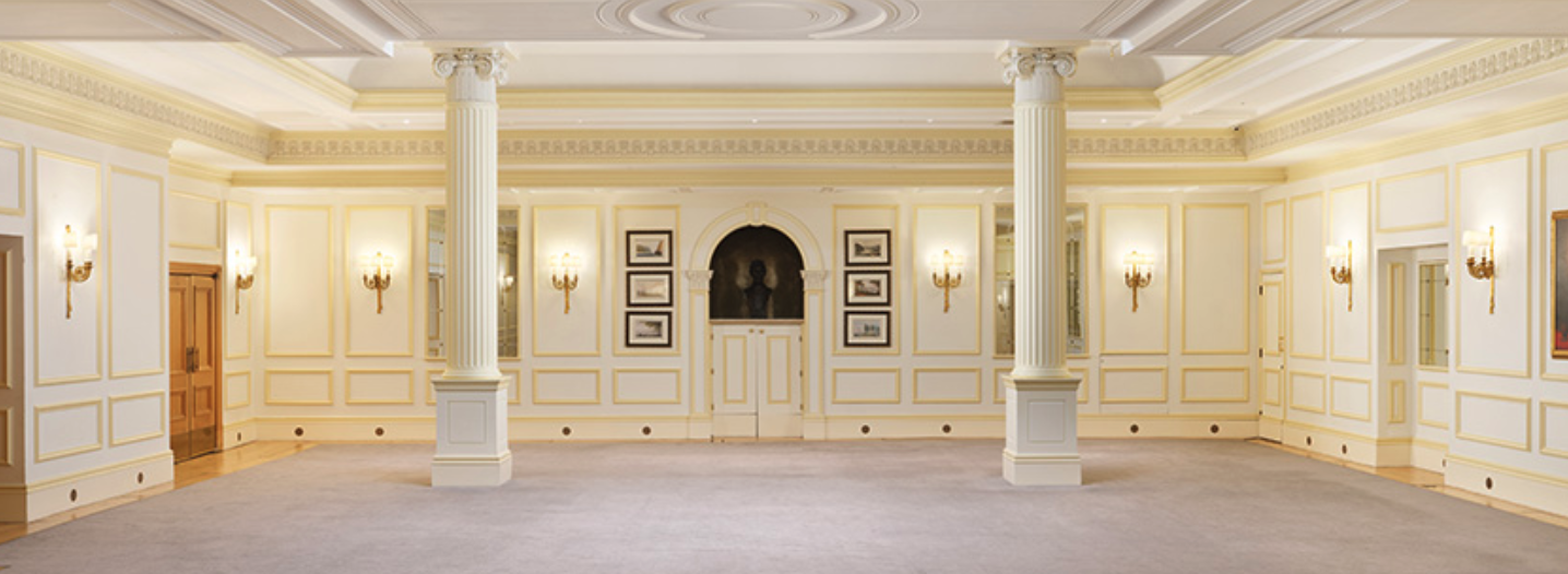 Abraham Lincoln in The Savoy, elegant event space with tall columns, ideal for gatherings.