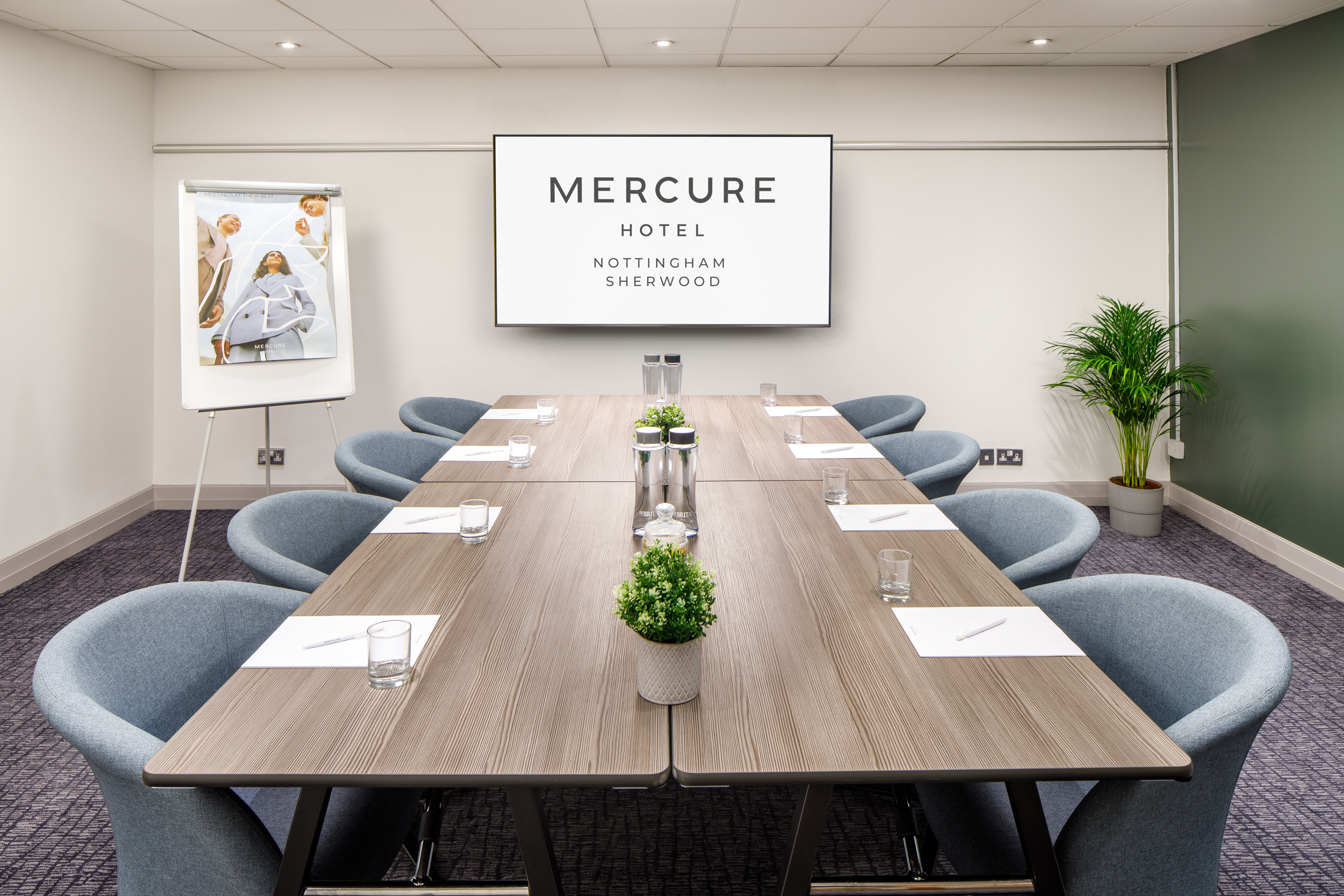 Meeting Room 1 at Mercure Nottingham: modern space with long table for events and presentations.
