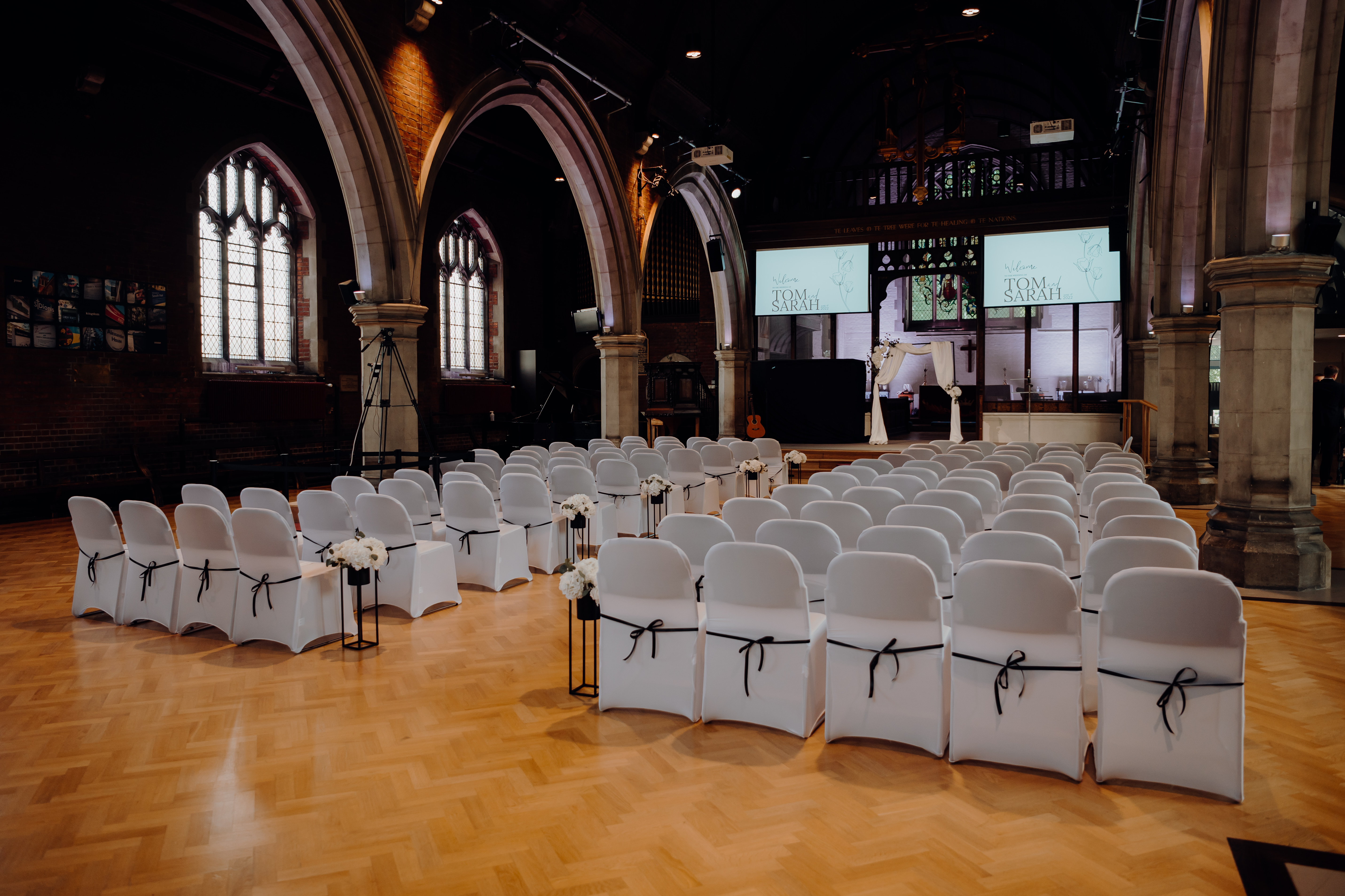 St Dionis Church event space with elegant chairs, ideal for meetings and celebrations.