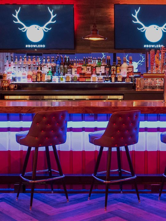 Stylish bar at Bowlero Cerritos, perfect for networking events and social gatherings.