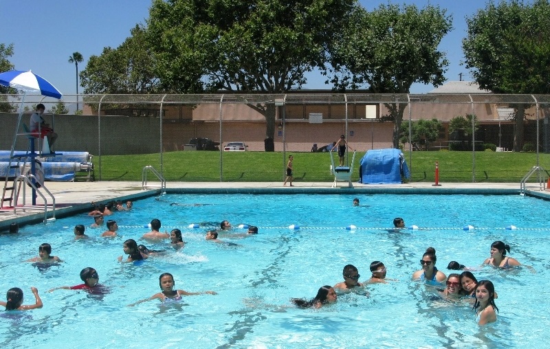 Vibrant pool scene at El Monte Aquatic Center for summer events and team-building activities.