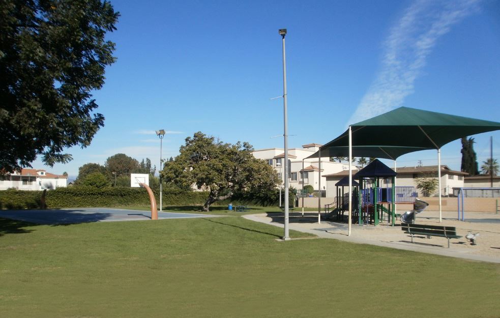 Outdoor courtyard at El Monte City Hall with playground, ideal for community events and gatherings.