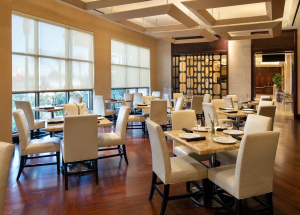 Park Grill Restaurant: modern venue with natural light for corporate events and private dining.