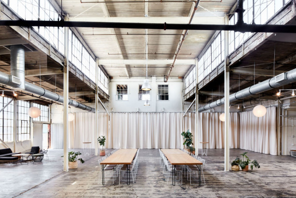 Spacious industrial bar and lounge in Frankie LA, perfect for events and meetings.