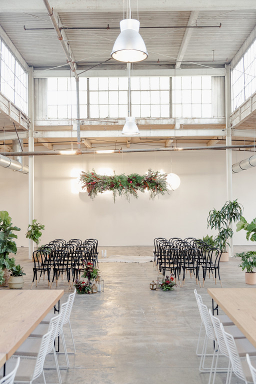 Upstairs Room at FRANKIE LA: elegant event space with floral decor, perfect for gatherings.