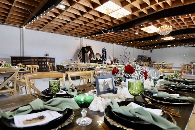 Elegant dessert table with floral arrangements for weddings and upscale gatherings.