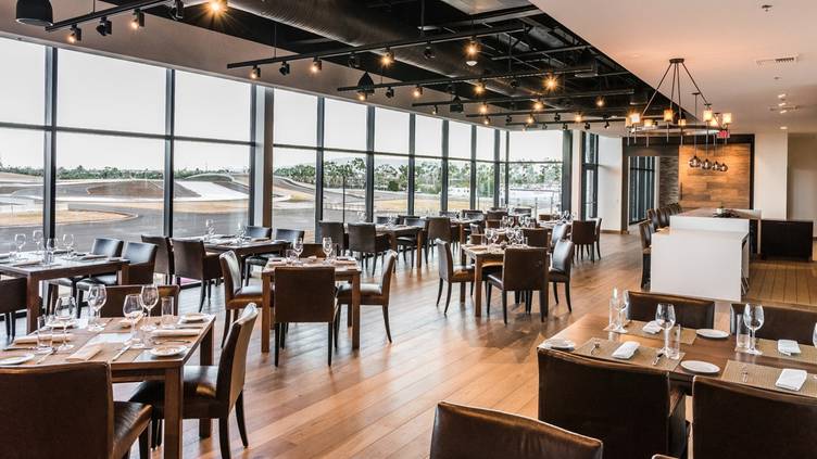 Modern meeting room at Porsche Experience Center LA, ideal for corporate events and gatherings.