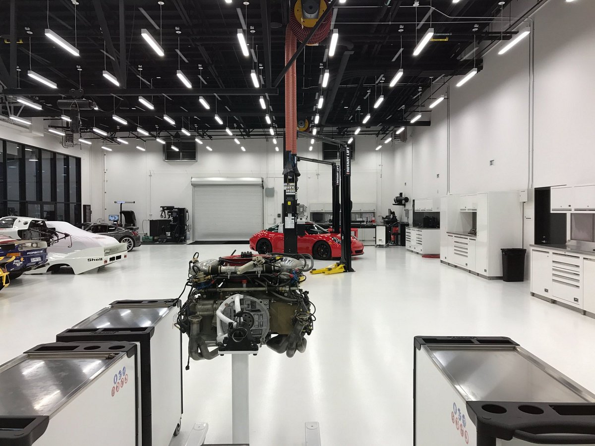 Modern automotive workshop at Porsche Experience Center for corporate events and team-building.