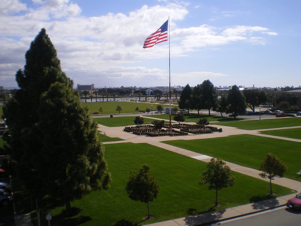 Ingram Plaza at Liberty Station with American flag, perfect for outdoor events and gatherings.