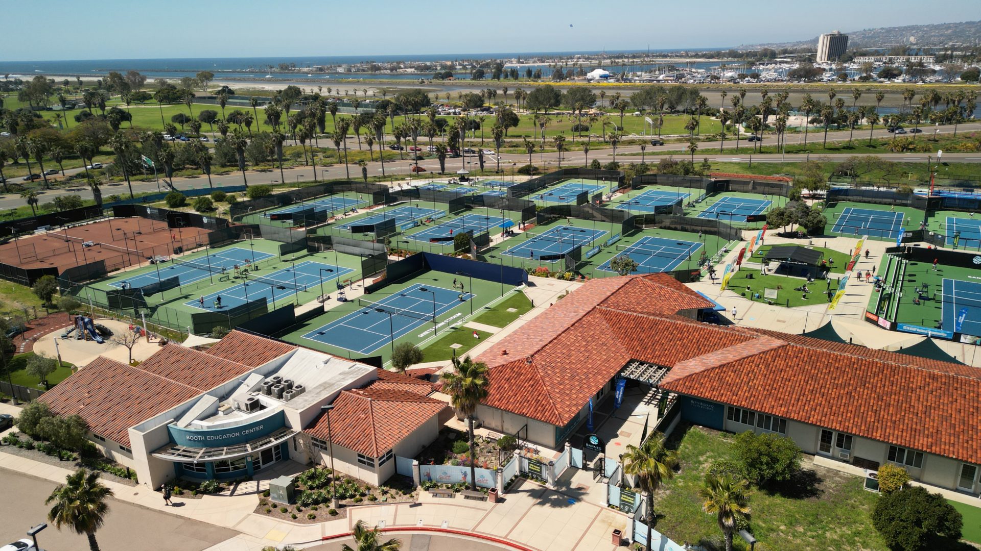 Point Loma Tennis Club community center with vibrant courts for corporate retreats and events.