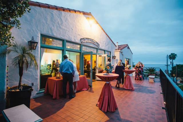 Elegant balcony venue with ocean view for receptions and networking events.