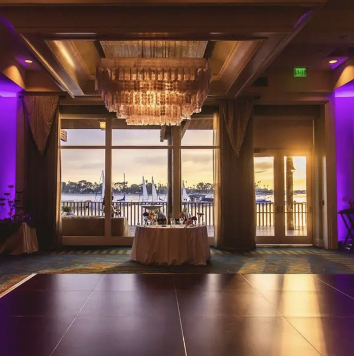 Elegant Sunset Pavilion North event space with waterfront view, perfect for weddings and meetings.