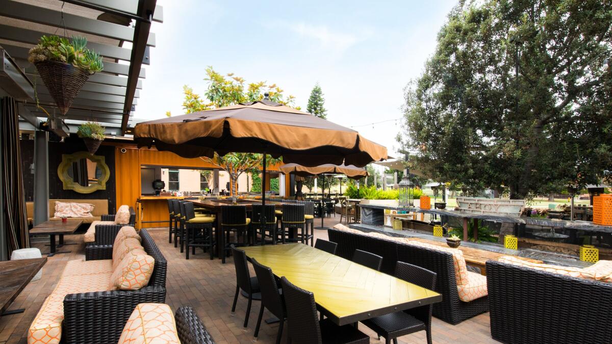 Versatile outdoor event space with comfortable seating for gatherings and receptions.