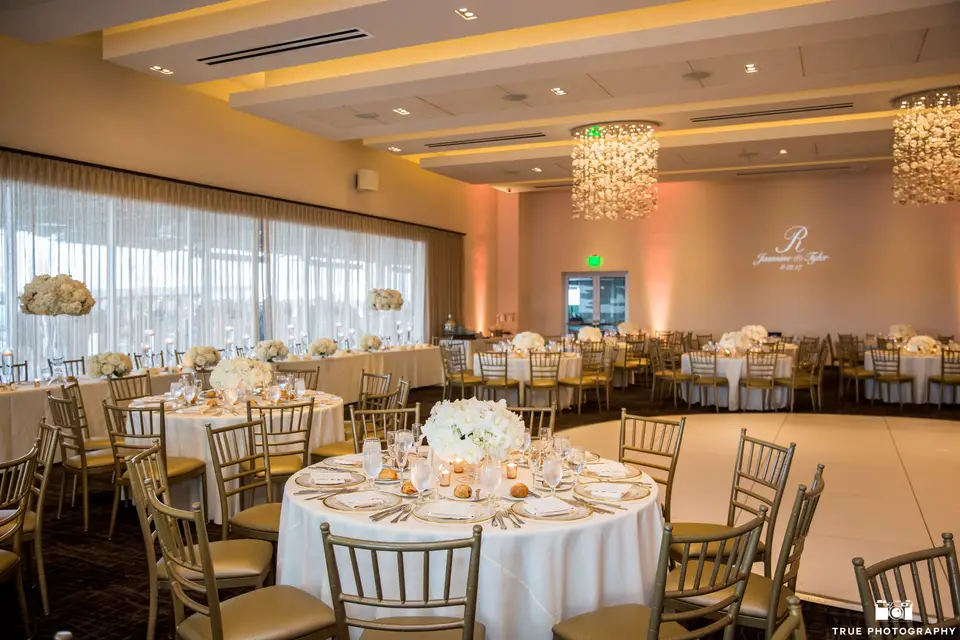 Skyline Terrace event space with elegant tables, ideal for weddings and gatherings.
