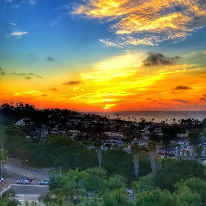 Stunning sunset at Sea & Sky restaurant, perfect for outdoor receptions and gatherings.