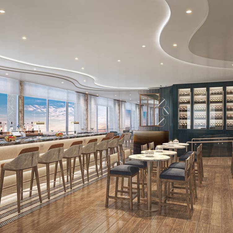 Modern event space with sleek bar and large windows for networking or cocktail receptions.