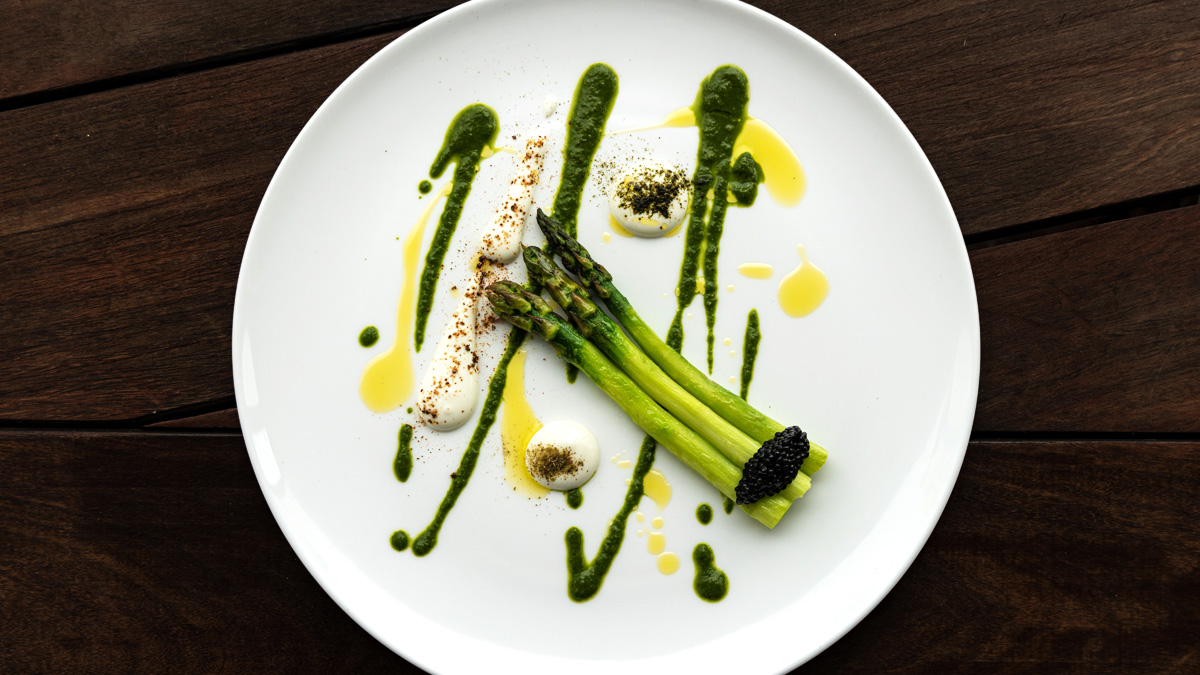 Vibrant asparagus dish showcasing culinary aesthetics for upscale events and catering.