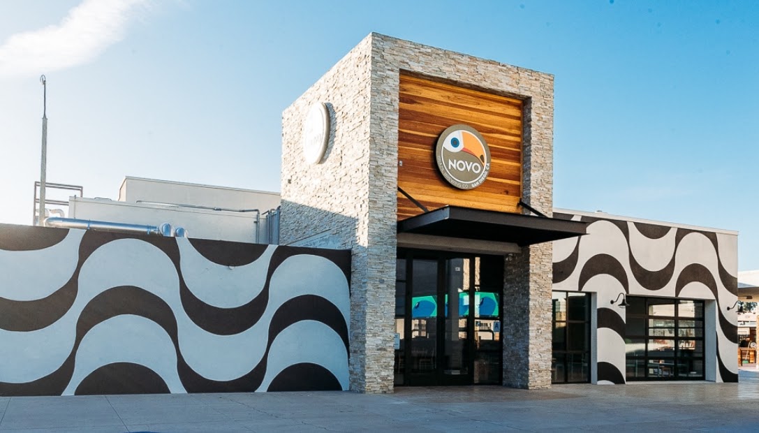 Modern Tasting Room at Novo Brazil Brewing with striking stone exterior, ideal for events.