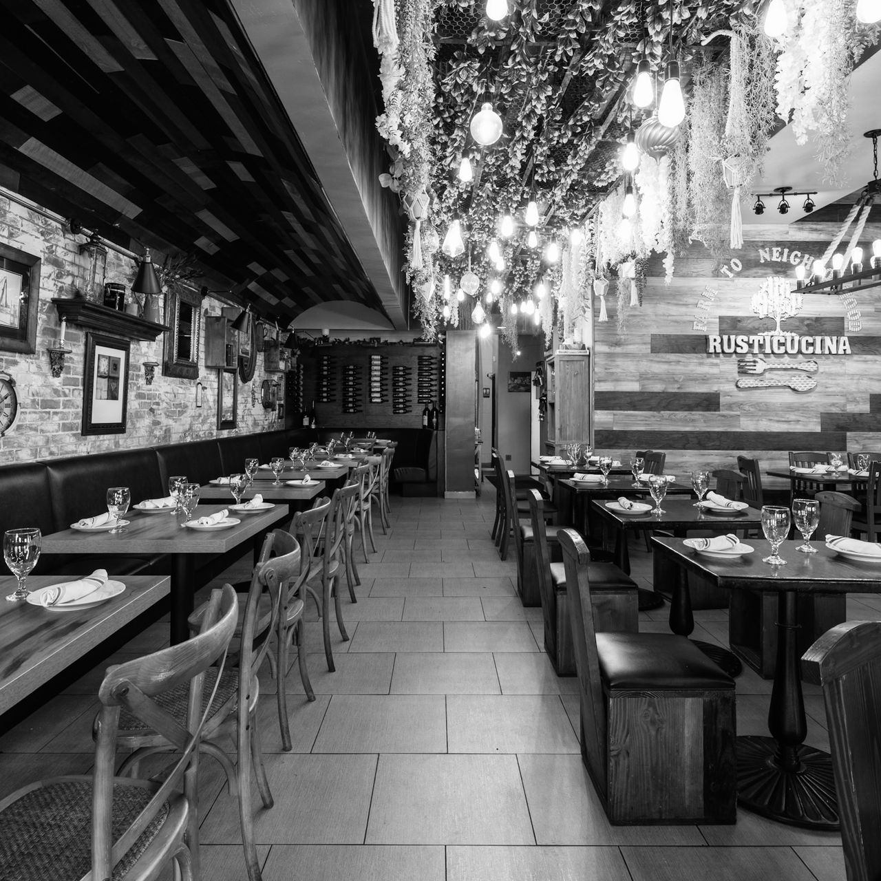 Charming rustic restaurant with warm lighting, perfect for gatherings and events.