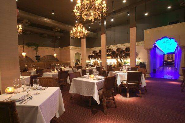 Elegant banquet hall with chandeliers for upscale events and intimate gatherings.