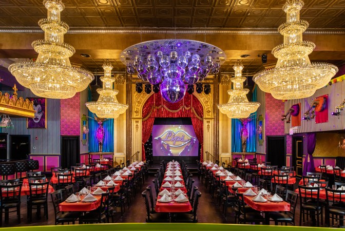 Vibrant event venue in San Diego with elegant chandeliers for corporate gatherings.