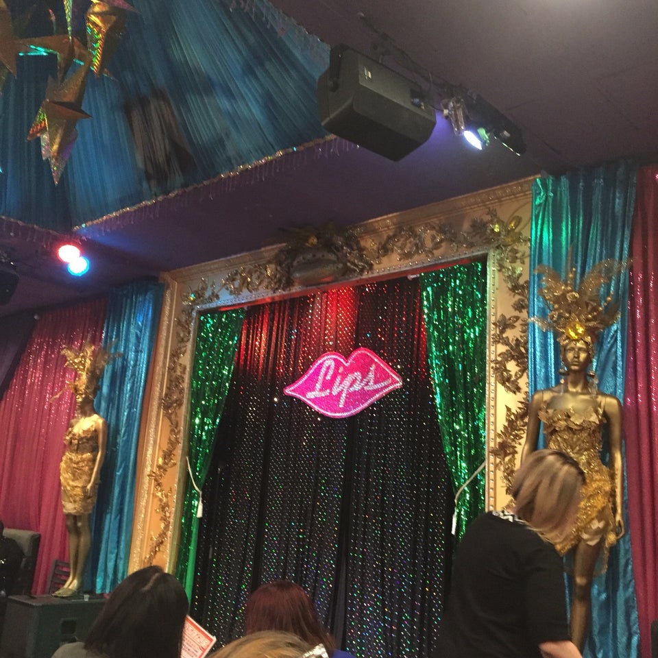 Vibrant event venue in San Diego with glamorous stage, ideal for drag shows and performances.