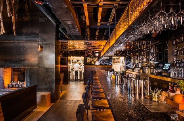 Stylish bar at Crow's Nest, Kettner Exchange, ideal for networking events and gatherings.